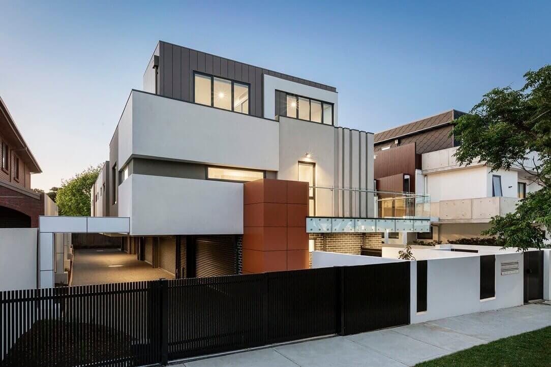 Photorealistic render of a modern house with wood cladding