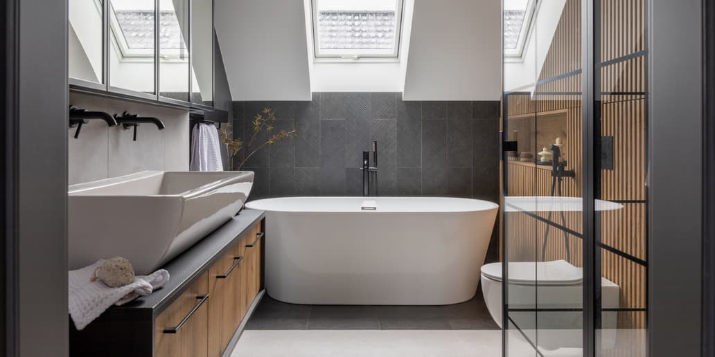 AI-rendered marble bathroom with freestanding tub and backlit mirrors
