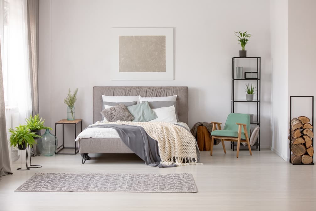 Bright bedroom photo uploaded as the starting point for an interior render