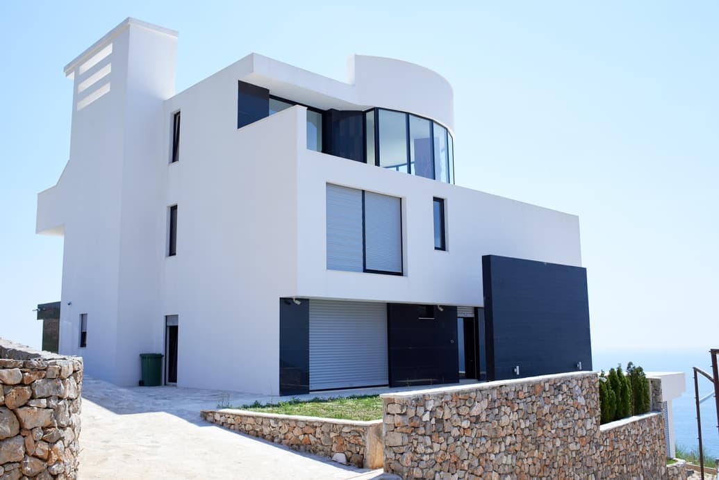 Photorealistic render of the same white modern house